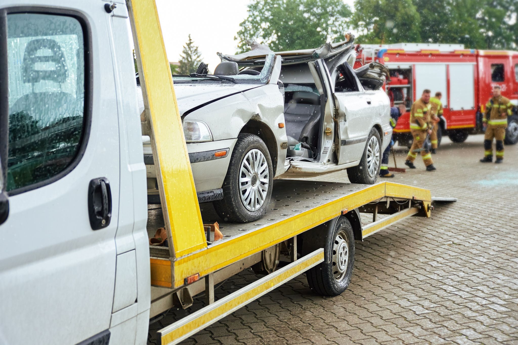 a car on a flatbed truck